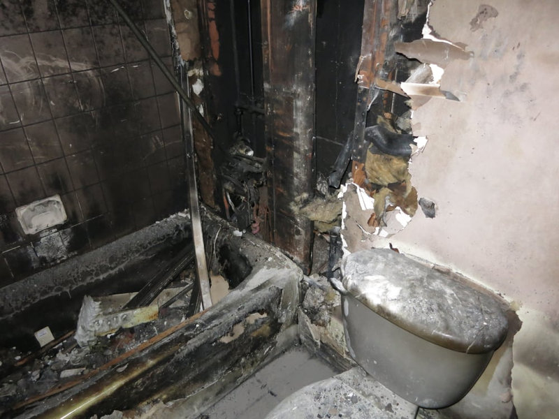 Fire damaged bathroom before restoration