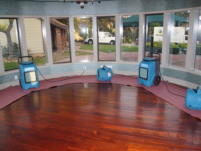 Structural drying equipment set up inside a home